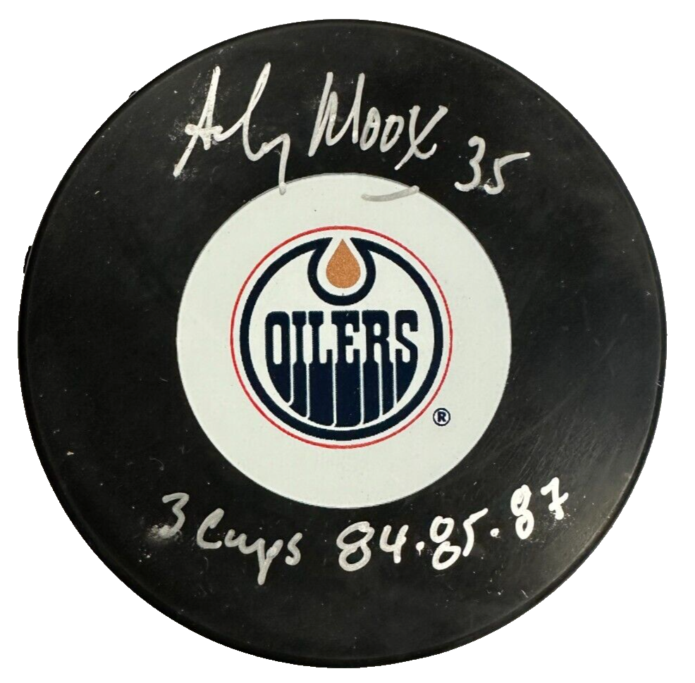 Andy Moog Autographed Edmonton Oilers Hockey Puck W/ 3 Cups 84-85-87 Inscription