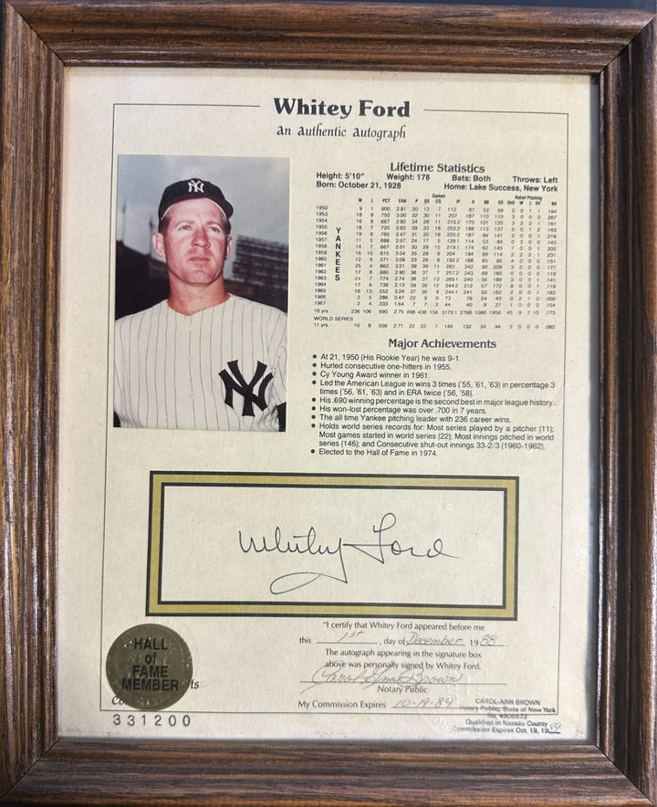 Whitey Ford Autographed Stat Sheet W/ Picture of Signing on Back Notary COA