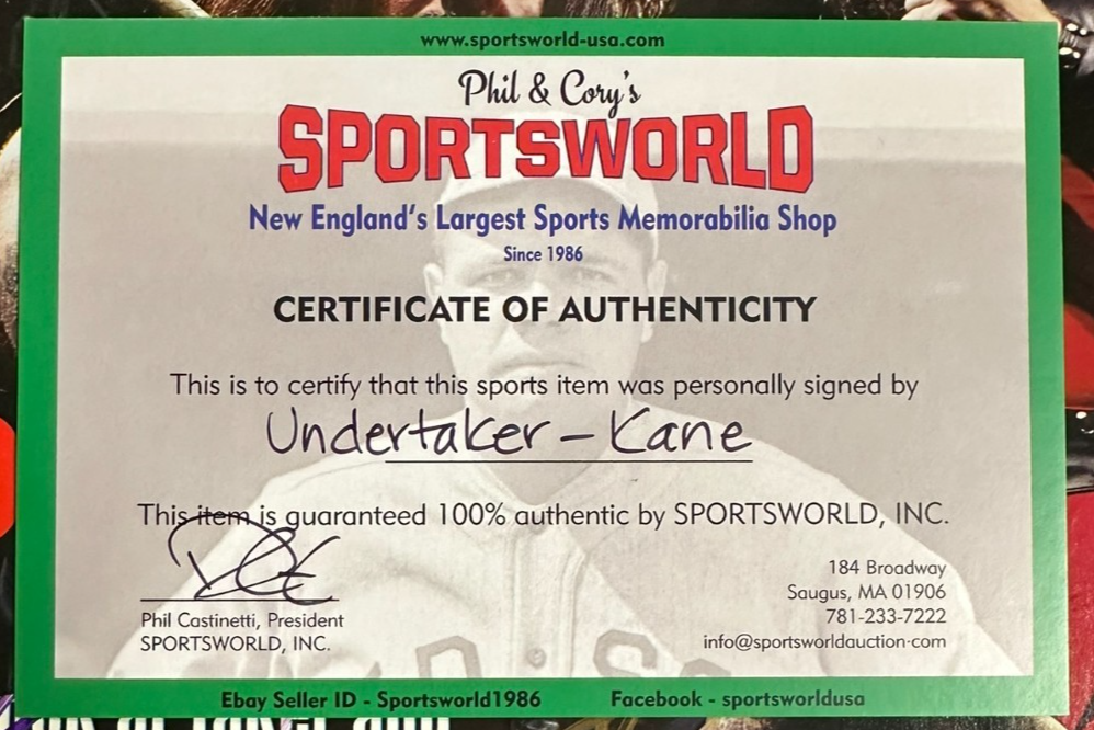 The Undertaker & Kane Autographed December 1998 Issue of WWE Raw Magazine