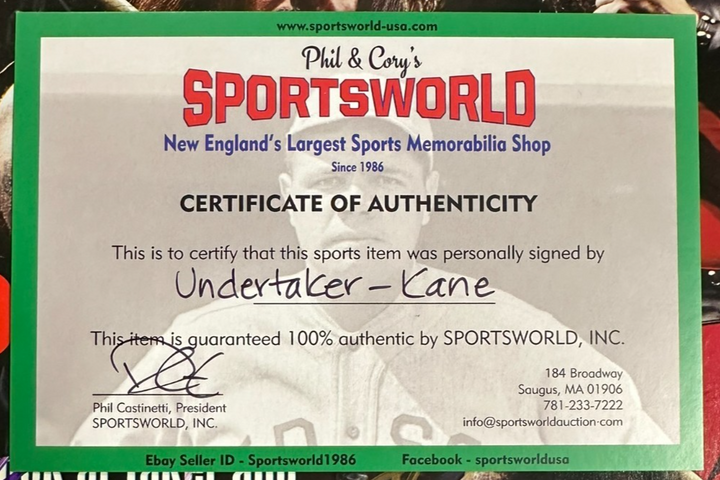 The Undertaker & Kane Autographed December 1998 Issue of WWE Raw Magazine