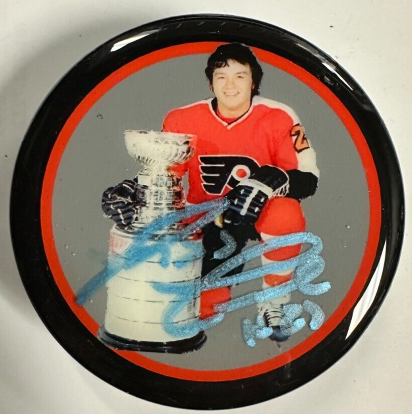 Reg Leach Autographed Philadelphia Flyers Photo Puck W/ Stanley Cup