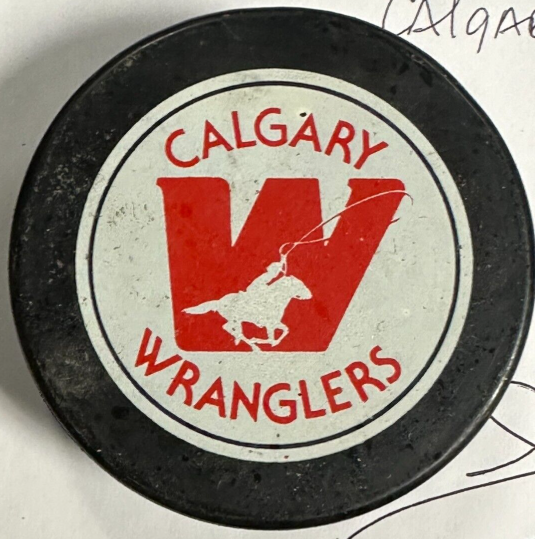 1980's Calgary Wranglers Game Used Puck WHL Jim Harrison Personal Collection