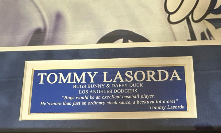 Framed Tommy Lasorda Autographed 16x20 Photo W/ Bugs Bunny & Daffy Duck PSA