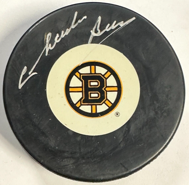 Charlie Burns Autographed Boston Bruins Hockey Puck BAS