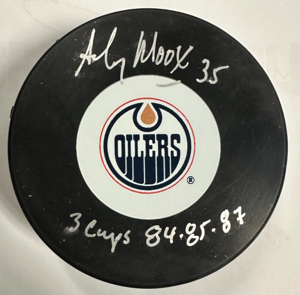 Andy Moog Autographed Edmonton Oilers Hockey Puck W/ 3 Cups 84-85-87 Inscription