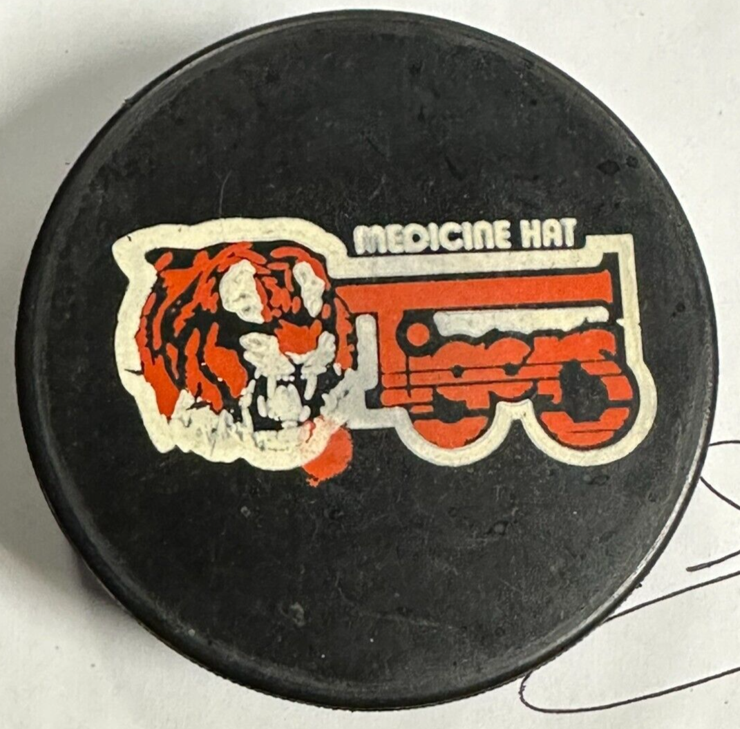1980's Medicine Hat Tigers Game Used Puck WHL Jim Harrison Personal Collection