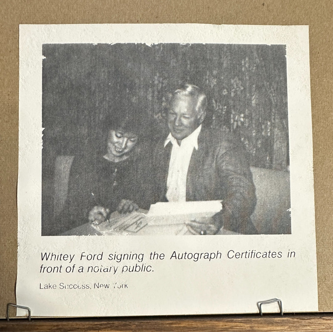 Whitey Ford Autographed Stat Sheet W/ Picture of Signing on Back Notary COA